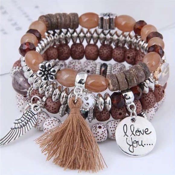 Jewelry - 4 piece women’s bohemian wooden bracelet